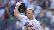 Sep 14, 2025; New York City, New York, USA; New York Mets first baseman Pete Alonso (20) throws his helmet after hitting a walk off three run home run against the Texas Rangers during the tenth inning at Citi Field. Mandatory Credit: Gregory Fisher-Imagn Images