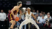 Feb 4, 2025; University Park, Pennsylvania, USA; Penn State Nittany Lions guard Nick Kern Jr (3) defends as Minnesota Golden Gophers forward Dawson Garcia (3) holds the ball during the first half at Bryce Jordan Center. Mandatory Credit: Matthew O'Haren-Imagn Images