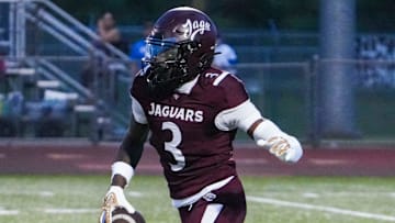 Appoquinimink's Jahsiear Rogers takes the opening kickoff for a touchdown but the return is nullified by a penalty in the Jaguars' 34-20 win against Dover at Appoquinimink, Sept 5, 2025.