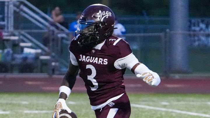 Appoquinimink's Jahsiear Rogers takes the opening kickoff for a touchdown but the return is nullified by a penalty in the Jaguars' 34-20 win against Dover at Appoquinimink, Sept 5, 2025.