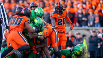 A pack of Oregon State defenders stop Oregon   s Noah Whittington as the No. 9 Oregon Ducks take on the No. 21 Oregon State Beavers at Reser Stadium in Corvallis, Ore. Saturday, Nov. 26, 2022.

Ncaa Football Uo Vs Osu Rivalry Game University Of Oregon At Oregon State