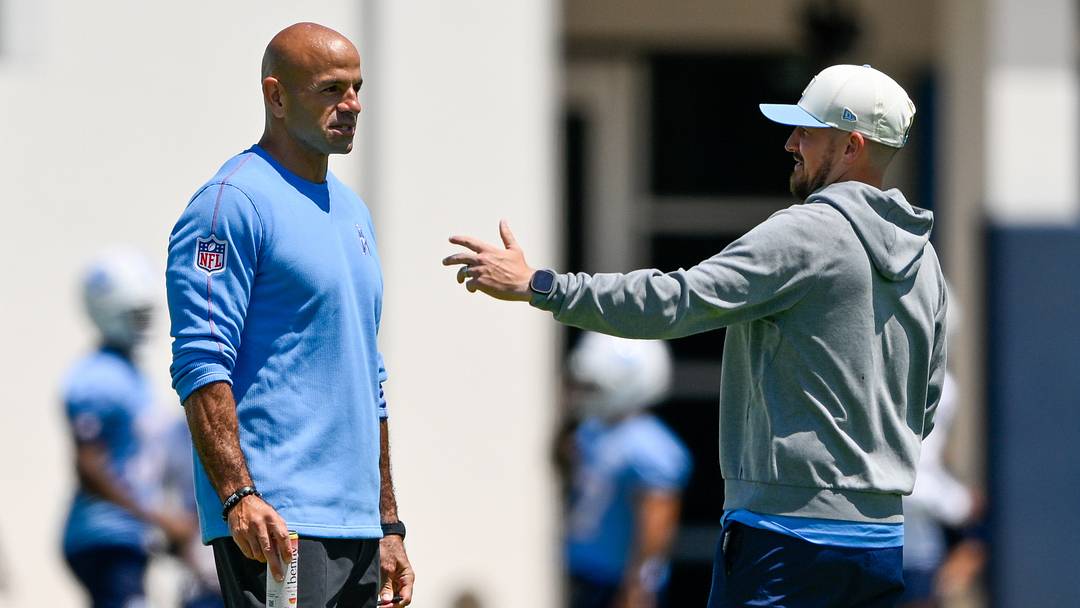 Jun 16, 2026; Nashville, TN, USA;  Tennessee Titans head coach Robert Saleh talks with quarterbacks coach Shea Tierney during day 1 of mini-camp at Vanderbilt Health Football Center. Mandatory Credit: Steve Roberts-Imagn Images