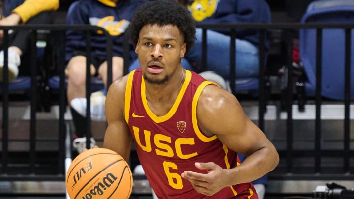 Feb 7, 2024; Berkeley, California, USA; USC Trojans guard Bronny James (6) dribbles the ball against the California Golden Bears during the second half at Haas Pavilion.