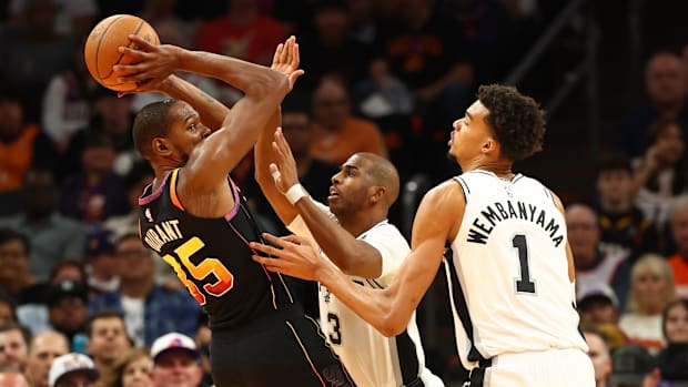 Phoenix Suns forward Kevin Durant (35) against San Antonio Spurs guard Chris Paul (3) and center Victor Wembanyama