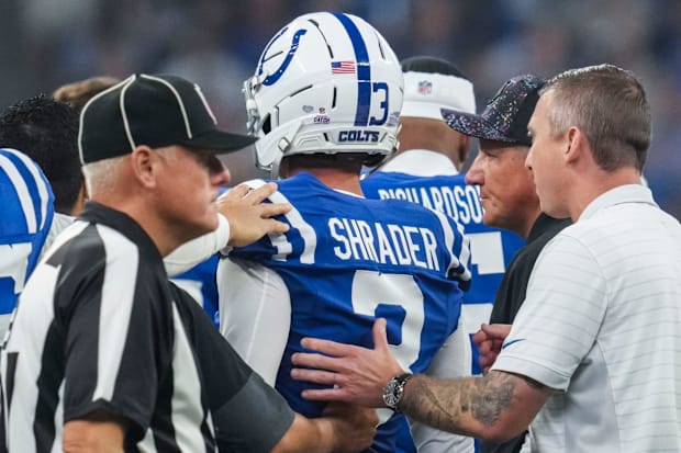 Indianapolis Colts kicker Spencer Shrader (3) is helped off the field after a collision.