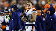 Dec 28, 2024; Cincinnati, Ohio, USA; Denver Broncos quarterback Bo Nix (10) stands on the sidelines during the second half against the Cincinnati Bengals at Paycor Stadium. Mandatory Credit: Katie Stratman-Imagn Images