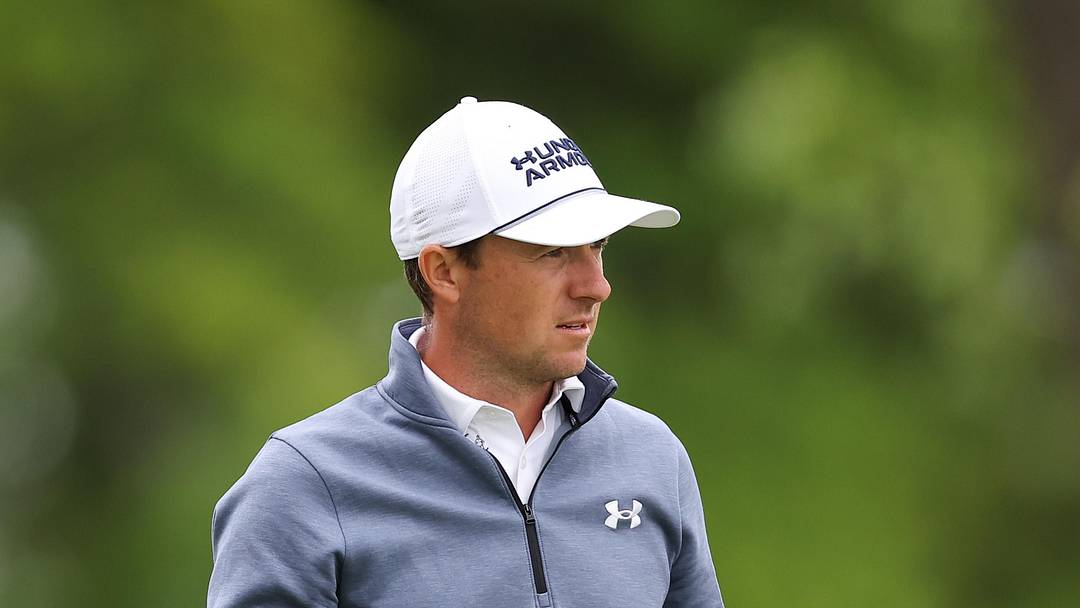 Jordan Spieth prepares to take a shot during a practice round of the PGA Championship golf tournament at Aronimink Golf Club