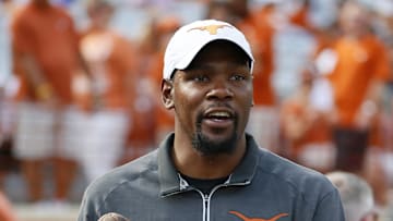 Sept. 10, 2016; Austin, TX, USA;  Oklahoma City Thunder NBA player and former Texas Longhorn Kevin Durant throws the football before the game against the University of Texas at El Paso at Darrell K Royal-Texas Memorial Stadium.