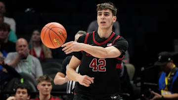 Mar 13, 2025; Charlotte, NC, USA; Stanford Cardinal forward Maxime Raynaud (42) passes the ball in the first half at Spectrum Center. Mandatory Credit: Bob Donnan-Imagn Images