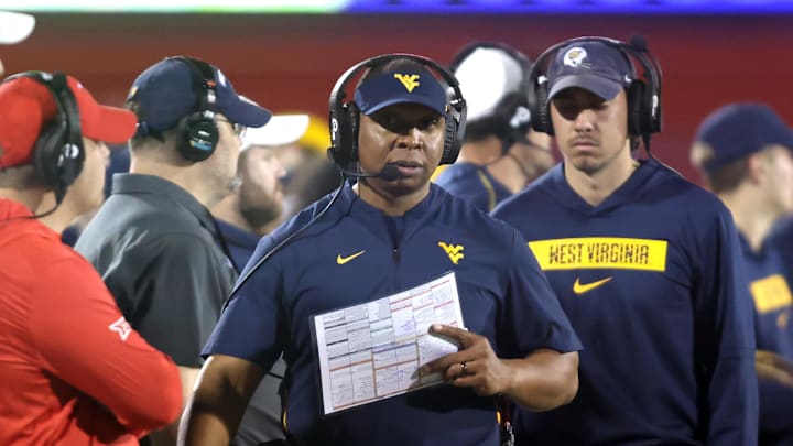 Dec 17, 2024; Frisco, TX, USA; West Virginia Mountaineers interim head coach Chad Scott walks on the sidelines in the game against the Memphis Tigers at Toyota Stadium. Mandatory Credit: Tim Heitman-Imagn Images