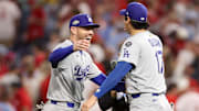 Los Angeles Dodgers first baseman Freddie Freeman (5) and designated hitter Shohei Ohtani (17) celebrate after defeating the Philadelphia Phillies in game two of the NLDS round for the 2025 MLB playoffs at Citizens Bank Park.
