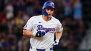 Jul 24, 2024; Arlington, Texas, USA; Texas Rangers shortstop Corey Seager (5) runs the bases after hitting a home run during the first inning against the Chicago White Sox at Globe Life Field. Mandatory Credit: Kevin Jairaj-USA TODAY Sports