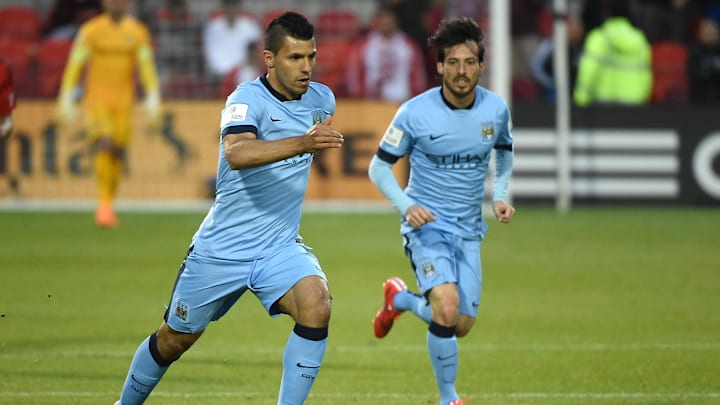 May 27, 2015; Toronto, Ontario, Canada; Manchester City forward Sergio Aguero (16) advances the ball upfield alongside midfielder David Silva (21) during the second half of an international club friendly at BMO Field against Toronto FD. Manchester City won 1-0.  Mandatory Credit: Dan Hamilton-Imagn Images