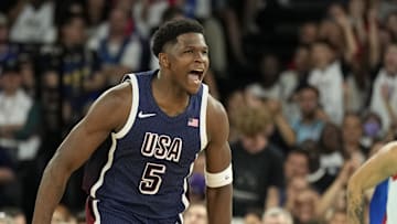Aug 10, 2024; Paris, France; United States guard Anthony Edwards (5) reacts against France in the second half in the men's basketball gold medal game during the Paris 2024 Olympic Summer Games at Accor Arena. Mandatory Credit: Kyle Terada-Imagn Images