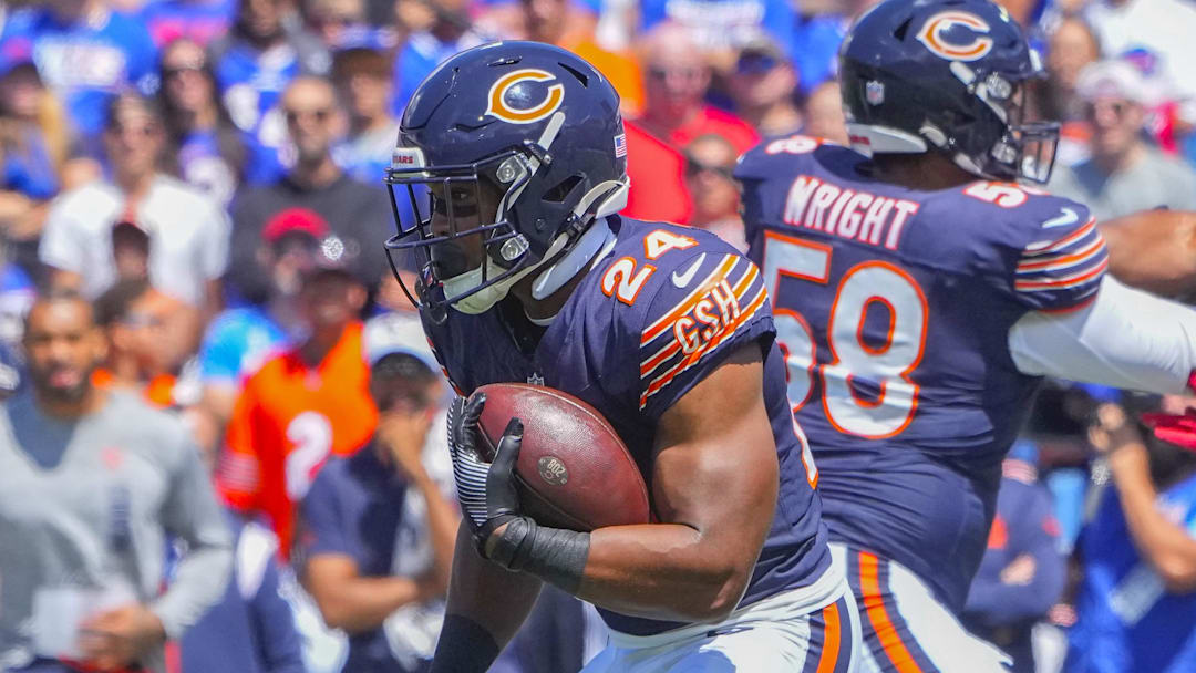 Aug 10, 2024; Orchard Park, New York, USA; Chicago Bears running back Khalil Herbert (24) runs with the ball against the Buffalo Bills during the first half at Highmark Stadium. Mandatory Credit: Gregory Fisher-Imagn Images
