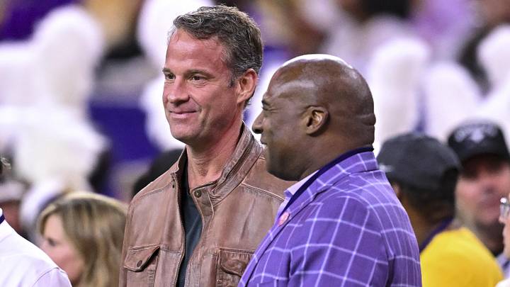 Dec 27, 2025; Houston, TX, USA; Louisiana State Tigers head coach Lane Kiffin, left, stands next to Louisiana State Tigers athletic director Verge Ausberry, right, prior to the game against the Houston Cougars at NRG Stadium. Mandatory Credit: Maria Lysaker-Imagn Images 