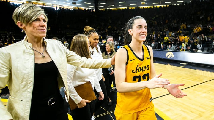 Iowa associate head coach Jan Jensen and Iowa guard Caitlin Clark (22) celebrate after a NCAA Big Ten Conference women's basketball game against Penn State, Saturday, Jan. 14, 2023, at Carver-Hawkeye Arena in Iowa City, Iowa. Iowa won, 108-67.

230114 Penn St Iowa Wbb 039 Jpg