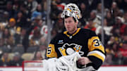 Dec 23, 2024; Pittsburgh, Pennsylvania, USA;  Pittsburgh Penguins goaltender Tristan Jarry (35) returns to his net against the Philadelphia Flyers during the second period at PPG Paints Arena. Mandatory Credit: Charles LeClaire-Imagn Images