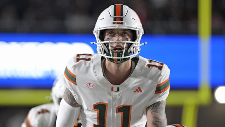 Oct 4, 2025; Tallahassee, Florida, USA; Miami Hurricanes quarterback Carson Beck (11) at the line during the first half against the Florida State Seminoles at Doak S. Campbell Stadium. Mandatory Credit: Melina Myers-Imagn Images