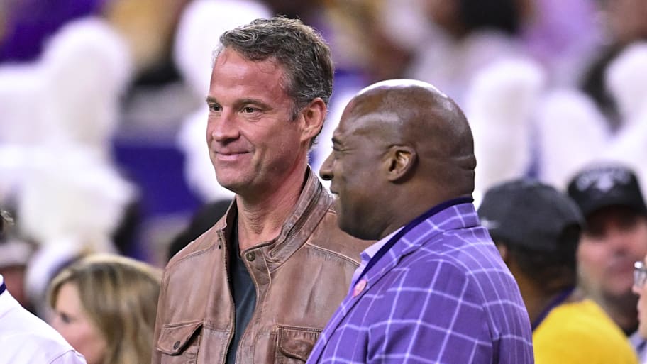 LSU football coach Lane Kiffin with LSU athletic director Verge Ausberry.
