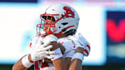 Severn Spalding wide receiver Myles Mcafee, top, catches a touchdown pass over Hoban cornerback Elbert ÒRockÓ Hill IV during the first half of a high school football game, Friday, Aug. 23, 2024, in Akron, Ohio.