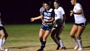 Reese McDougal of Seven Rivers Christian, 7, battles for the ball against Weeki Wachee in match on Dec. 20, 2024.
