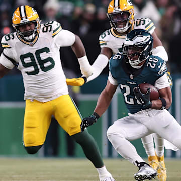 Philadelphia Eagles running back Saquon Barkley rushes the ball against the Green Bay Packers during their wild-card game.
