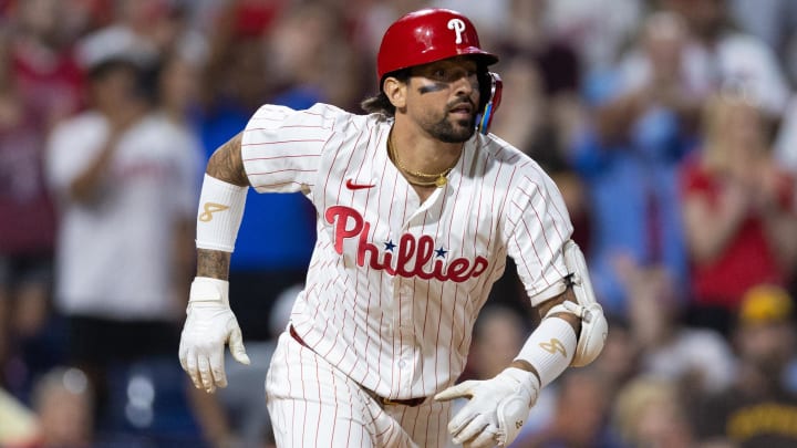 Jun 18, 2024; Philadelphia, Pennsylvania, USA; Philadelphia Phillies outfielder Nick Castellanos (8) hits a game winning walk off RBI double during the ninth inning against the San Diego Padres at Citizens Bank Park.