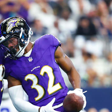 Sep 22, 2024; Arlington, Texas, USA;  Baltimore Ravens safety Marcus Williams (32) celebrates with Baltimore Ravens linebacker Odafe Oweh (99) after recovering a fumble during the first half at AT&T Stadium. Mandatory Credit: Kevin Jairaj-Imagn Images
