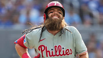 Sep 4, 2024; Toronto, Ontario, CAN; Philadelphia Phillies left fielder Brandon Marsh (16) reacts after getting hit with a pitch against the Philadelphia Phillies during the seventh inning at Rogers Centre