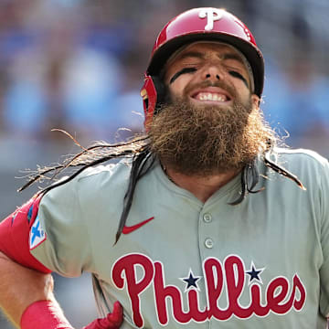 Sep 4, 2024; Toronto, Ontario, CAN; Philadelphia Phillies left fielder Brandon Marsh (16) reacts after getting hit with a pitch against the Philadelphia Phillies during the seventh inning at Rogers Centre