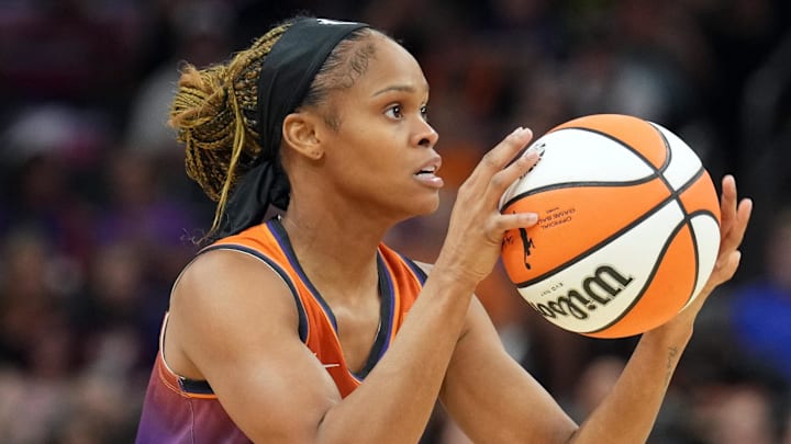 Aug 3, 2023; Phoenix, Arizona, USA; Phoenix Mercury guard Moriah Jefferson (8) controls the ball against the Atlanta Dream during the first half at Footprint Center. Mandatory Credit: Joe Camporeale-Imagn Images