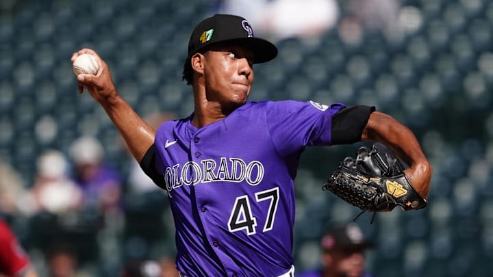 Aug 17, 2025; Denver, Colorado, USA; Colorado Rockies relief pitcher Juan Mejia (47) delivers a pitch in the ninth inning against the Arizona Diamondbacks at Coors Field. Mandatory Credit: Ron Chenoy-Imagn Images