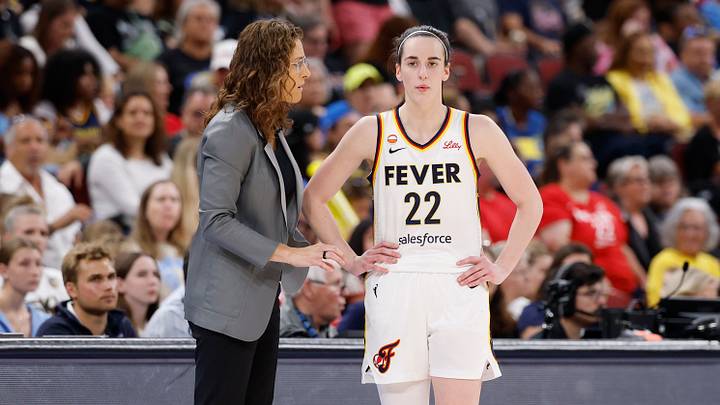 Aug 8, 2026; Chicago, Illinois, USA; Indiana Fever guard Caitlin Clark (22) talks with head coach Stephanie White during the first half of a WNBA game against the Chicago Sky at United Center. Mandatory Credit: Kamil Krzaczynski-Imagn Images