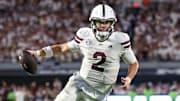 Mississippi State Bulldogs quarterback Blake Shapen (2) runs with the ball during overtime against the Tennessee Volunteers at Davis Wade Stadium at Scott Field. 