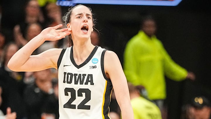 Iowa Hawkeyes guard Caitlin Clark (22) celebrates in the final seconds of a second-round NCAA Tournament game between Iowa and West Virginia, Monday, March 25, 2024 at Carver Hawkeye Arena in Iowa City. Iowa Hawkeyes guard Caitlin Clark (22) celebrates in the final seconds of a second-round NCAA Tournament game between Iowa and West Virginia, Monday, March 25, 2024 at Carver Hawkeye Arena in Iowa City.