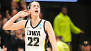 Iowa Hawkeyes guard Caitlin Clark (22) celebrates in the final seconds of a second-round NCAA Tournament game between Iowa and West Virginia, Monday, March 25, 2024 at Carver Hawkeye Arena in Iowa City.
