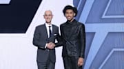 Jun 25, 2025; Brooklyn, NY, USA;  Dylan Harper stands with NBA commissioner Adam Silver after being selected as the second pick by the San Antonio Spurs in the first round of the 2025 NBA Draft at Barclays Center. Mandatory Credit: Brad Penner-Imagn Images