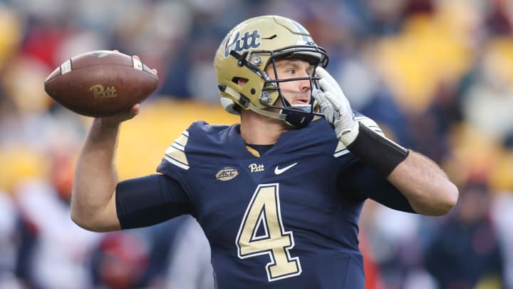 Nov 26, 2016; Pittsburgh, PA, USA;  Pittsburgh Panthers quarterback Nathan Peterman (4) passes against the Syracuse Orange during the third quarter at Heinz Field. PITT won 76-61. Mandatory Credit: Charles LeClaire-USA TODAY Sports