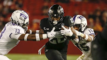 Iowa State junior running back Breece Hall busts through the defense of TCU linebacker Dee Winters, left, and safety Josh Foster en route to one of his four total touchdowns on Friday, Nov. 26, 2021, at Jack Trice Stadium in Ames.

20211126 Iowastatevstcu