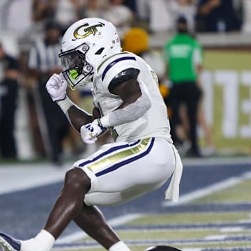 Aug 31, 2024; Atlanta, Georgia, USA; Georgia Tech Yellow Jackets running back Jamal Haynes (11) celebrates after a touchdown run against Georgia State Panthers in the first quarter at Bobby Dodd Stadium at Hyundai Field. Mandatory Credit: Brett Davis-Imagn Images