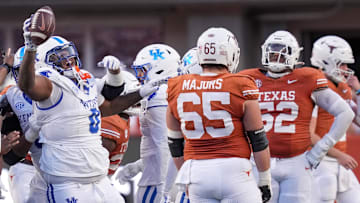 Nov 23, 2024; Austin, Texas, USA; Kentucky Wildcats defensive tackle Deone Walker (0) celebrates after a fumble recovery against Texas Longhorns in the third quarter at Darrell K Royal Texas Memorial Stadium. Mandatory Credit: Ricardo B. Brazziell/USA TODAY Network via Imagn Images