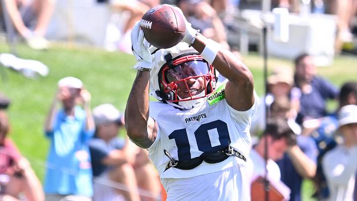 Jul 28, 2025; Foxborough, MA, USA; New England Patriots wide receiver Kyle Williams (18) makes a catch during training camp at Gillette Stadium. Mandatory Credit: Eric Canha-Imagn Images