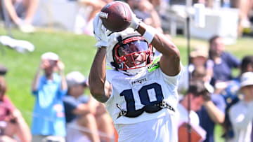 Jul 28, 2025; Foxborough, MA, USA; New England Patriots wide receiver Kyle Williams (18) makes a catch during training camp at Gillette Stadium. Mandatory Credit: Eric Canha-Imagn Images