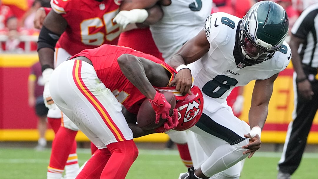 Kansas City Chiefs wide receiver Hollywood Brown (5) makes a reception defended by Philadelphia Eagles cornerback Adoree' Jackson (8) during the third quarter of the game at GEHA Field at Arrowhead Stadium.