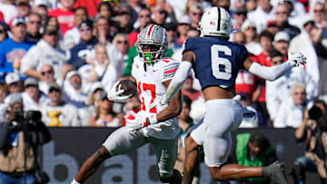 Ohio State Buckeyes wide receiver Carnell Tate (17) runs toward Penn State Nittany Lions safety Zakee Wheatley (6) during the NCAA football game at Beaver Stadium in University Park, Pa. on Monday, Nov. 4, 2024. Ohio State won 20-13.