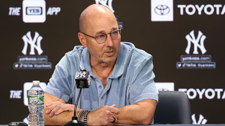 Aug 23, 2023; Bronx, New York, USA; New York Yankees general manager Brian Cashman talks with the media before the game between the Yankees and the Washington Nationals at Yankee Stadium. Mandatory Credit: Vincent Carchietta-Imagn Images