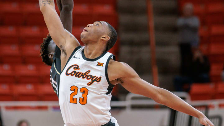 Feb 28, 2024; Stillwater, Oklahoma, USA; Oklahoma State Cowboys center Brandon Garrison (23)  in action at Gallagher-Iba Arena. Mandatory Credit: William Purnell-USA TODAY Sports