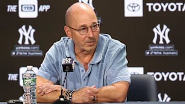Aug 23, 2023; Bronx, New York, USA; New York Yankees general manager Brian Cashman talks with the media before the game between the Yankees and the Washington Nationals at Yankee Stadium. Mandatory Credit: Vincent Carchietta-Imagn Images