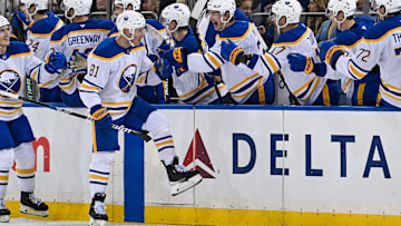 Nov 7, 2024; New York, New York, USA;  Buffalo Sabres center Sam Lafferty (81) celebrates his goal with the bench against the New York Rangers during the second period at Madison Square Garden. Mandatory Credit: Dennis Schneidler-Imagn Images